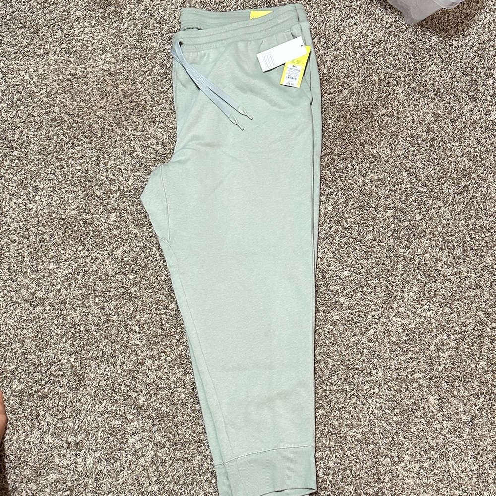Women’s Light sage green cotton joggers.